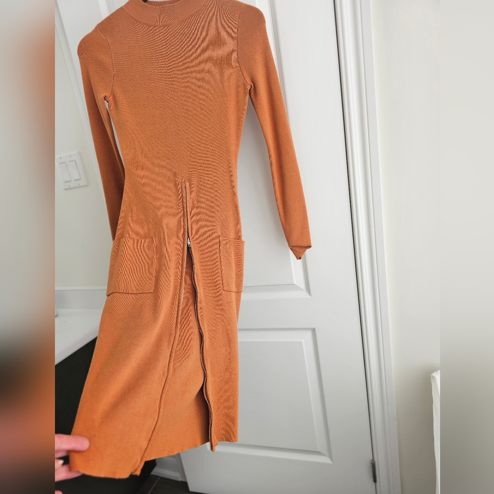 Room Service dress from Mendocino. Long sleeves.Stretchy. Sz M. No flaws.